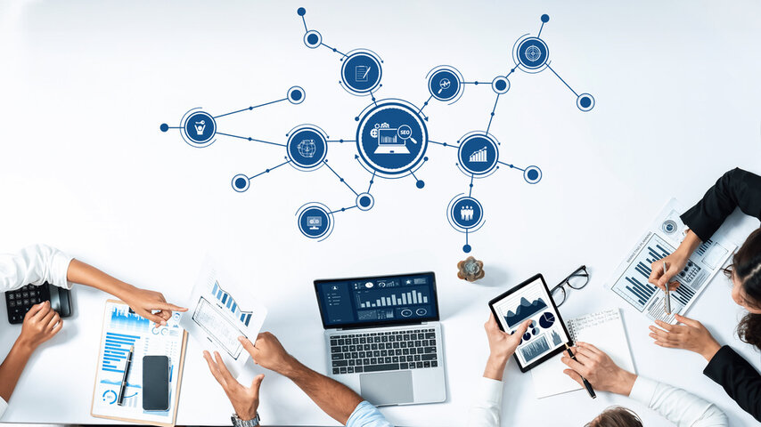 people looking the analytics data that are collected digitally and making plans for the business marketing. 